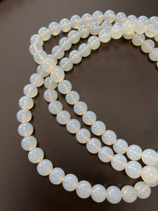 GLASS 10MM ROUND TRANSPARENT WHITE SMOKE ABOUT 40 BEADS PER 1 STRAND