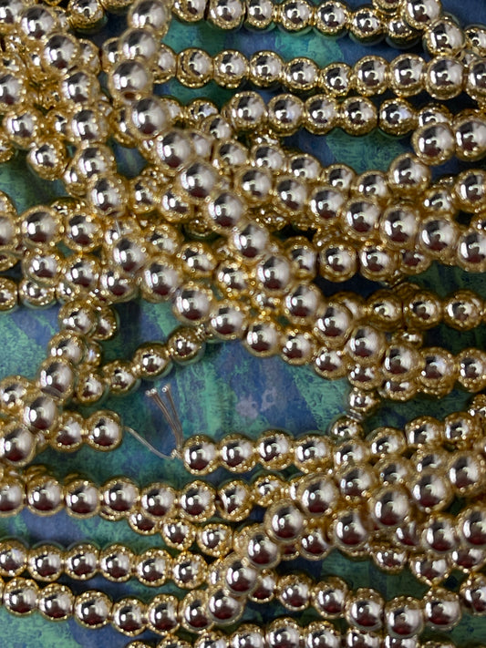 HEMATITE 4MM ROUND GOLD PLATE 1 STRAND
