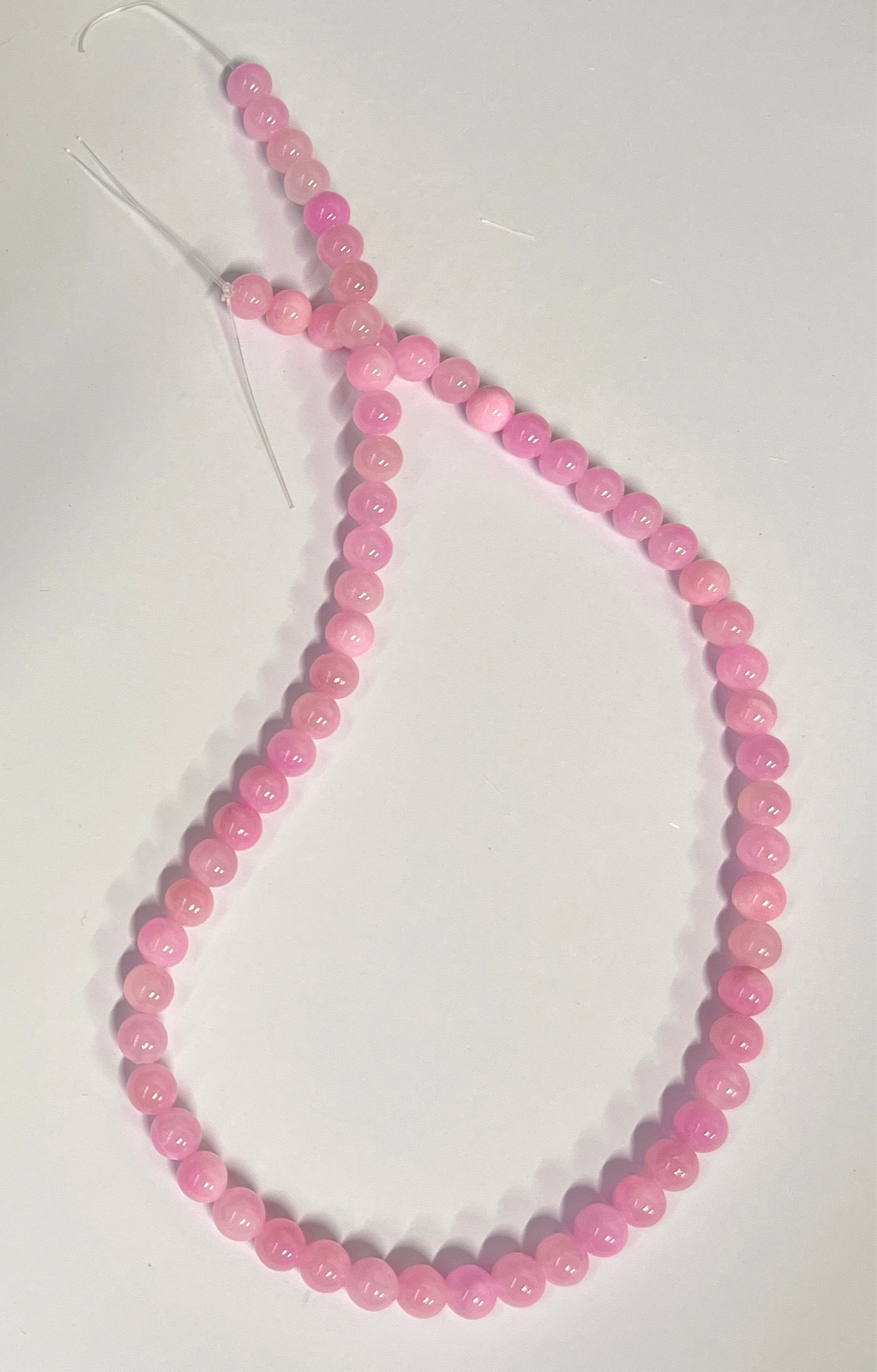 YELLOW JADE 6MM ROUND HOT PINK 1 STRAND