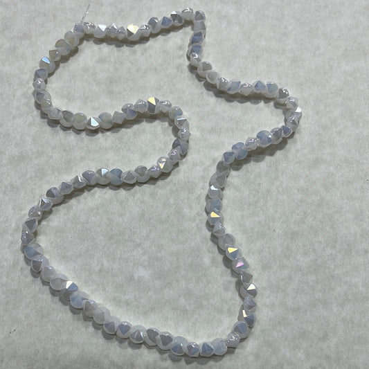 GLASS BICONE OPAQUE CREAMY WHITE 4X6X5MM