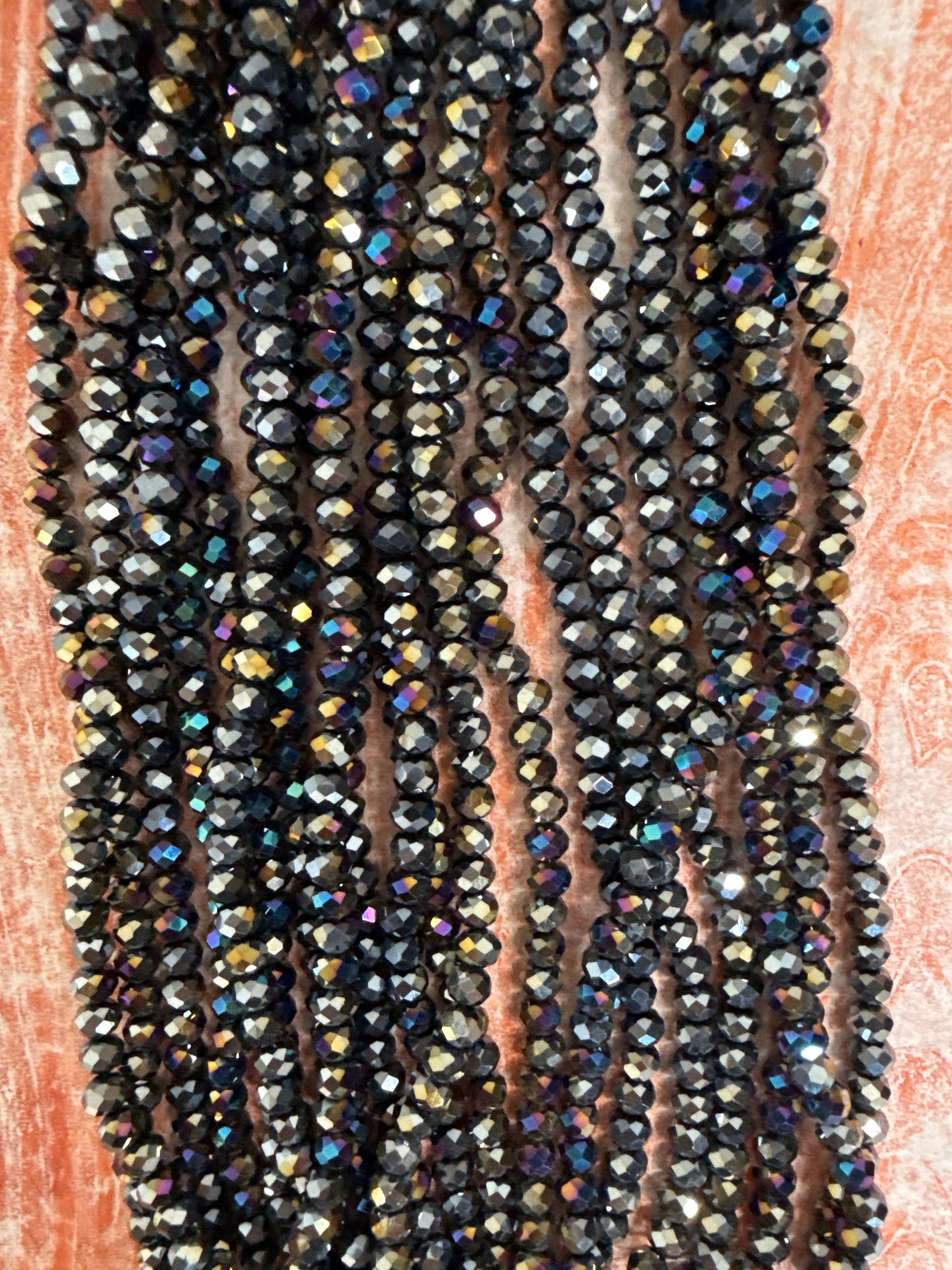 GLASS RONDELLE 6MM BLACK OPAQUE AB 1 STRAND