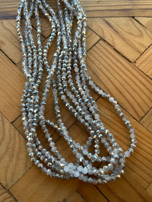 GLASS RONDELLE 4X3MM CLEAR SILVER 1 STRAND