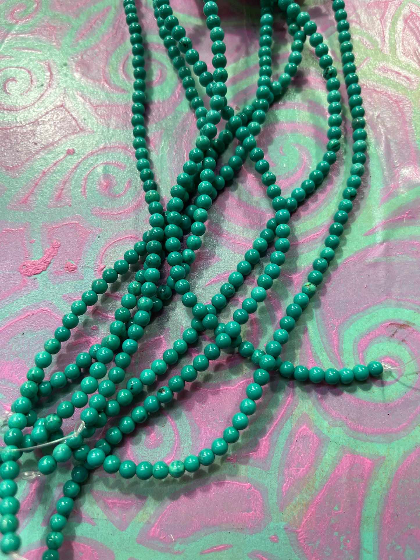 MAGNESITE 4MM ROUND MEDIUM TURQUOISE COLOR 1 STRAND