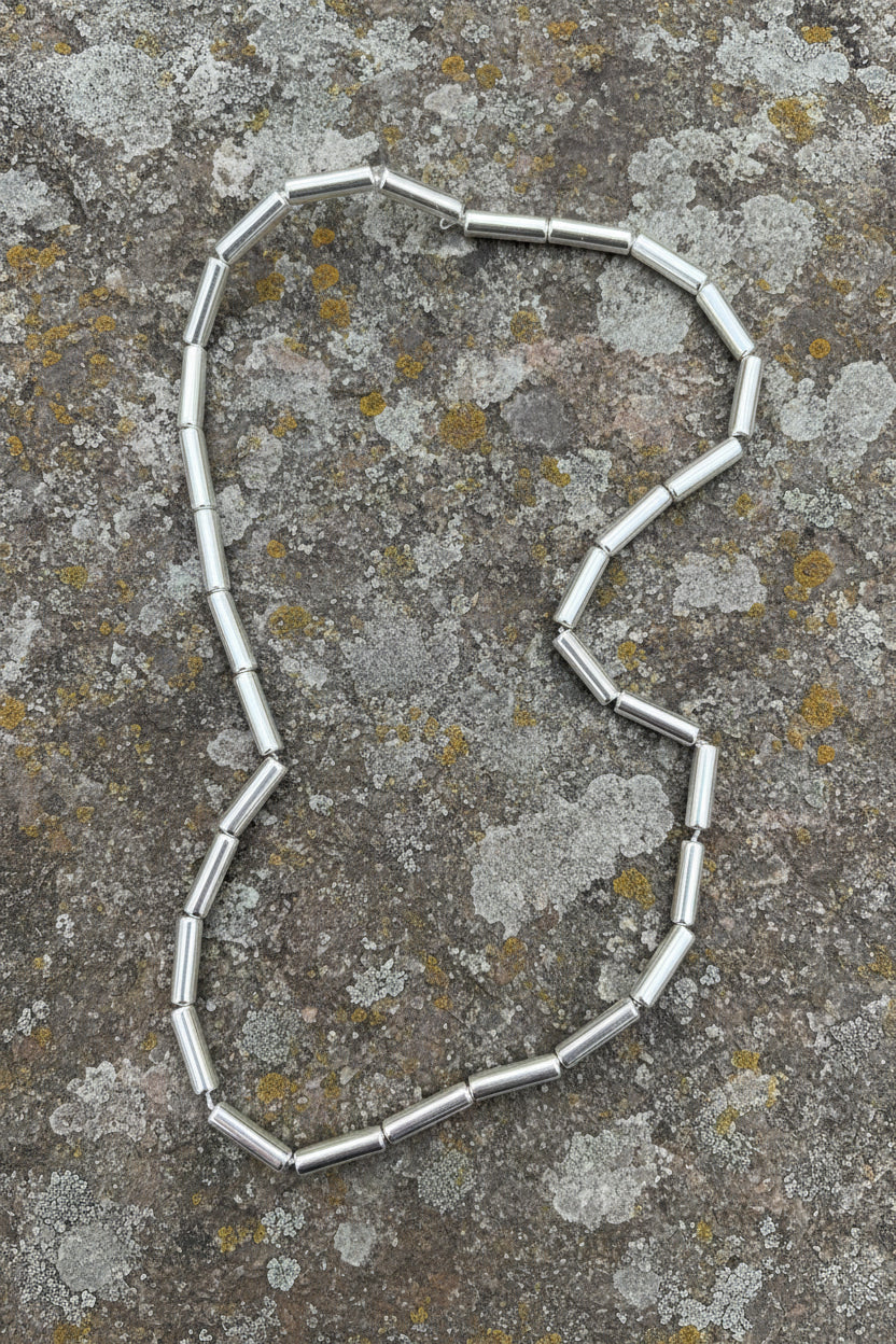 Hematite column 13x4 mm silver 1 strand