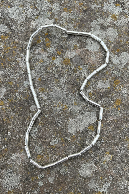 Hematite column 13x4 mm silver 1 strand