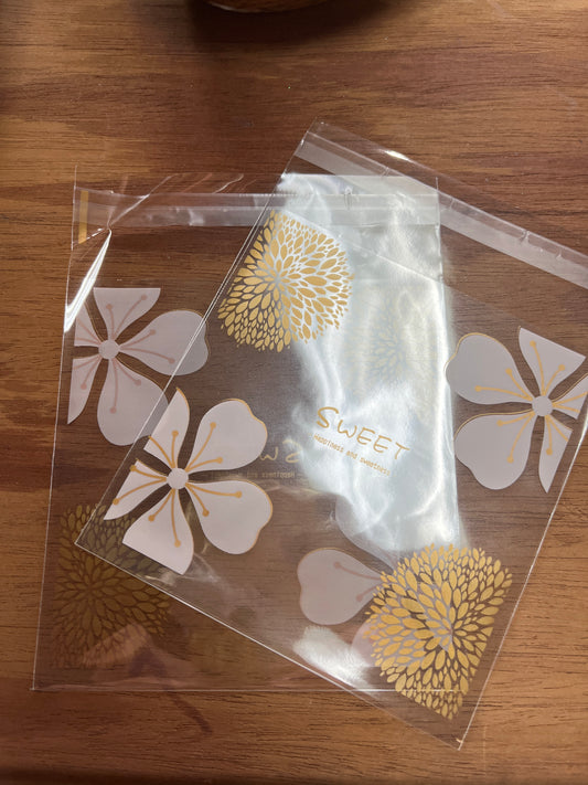 BAG CELLO PINK FLOWERS 10X10 CM 20 PC