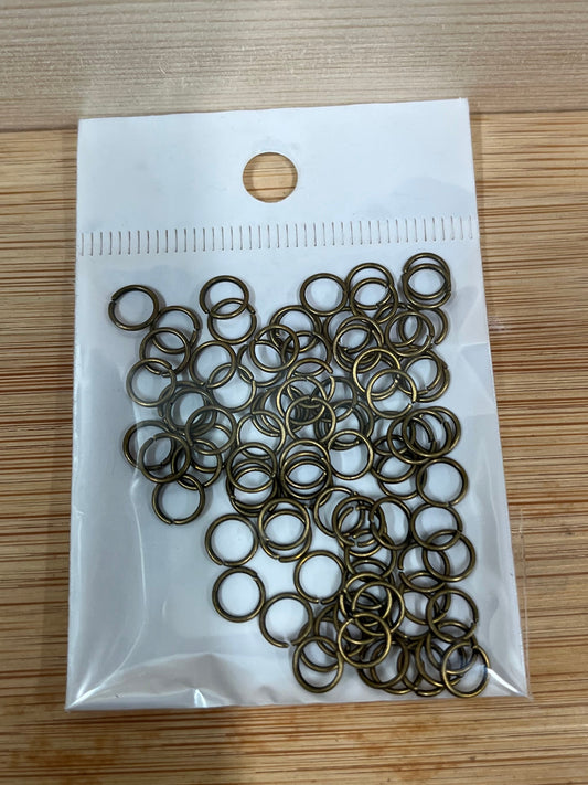 JUMPRING 6MM 21GA ANT BRONZE 90PC APROX