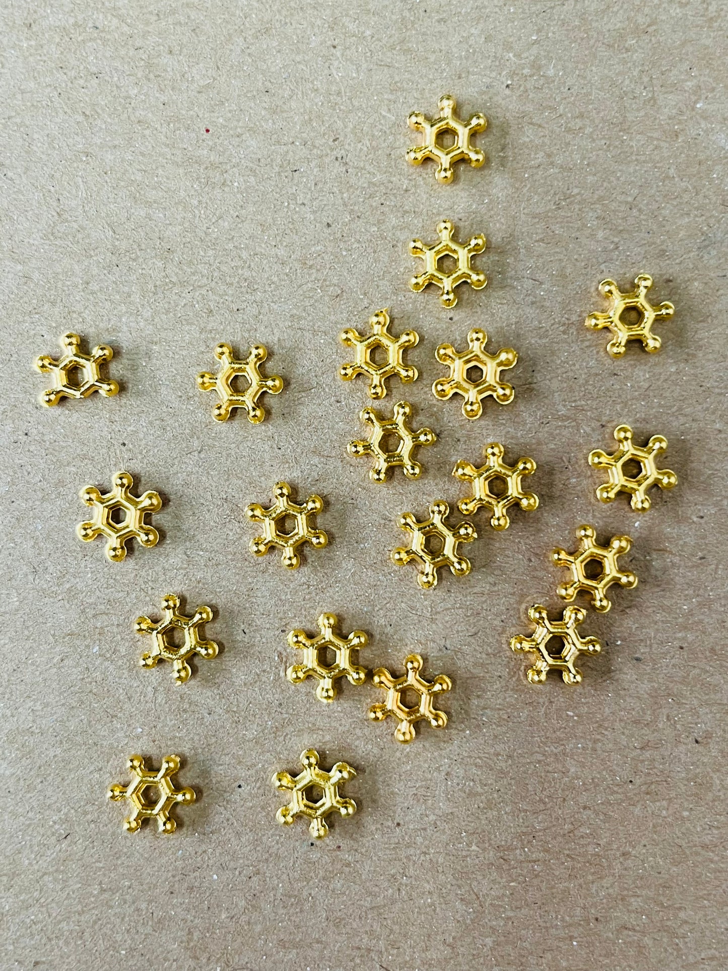 SPACER BEAD ACRYLIC SNOWFLAKE GOLD 7X2MM 20 PCS