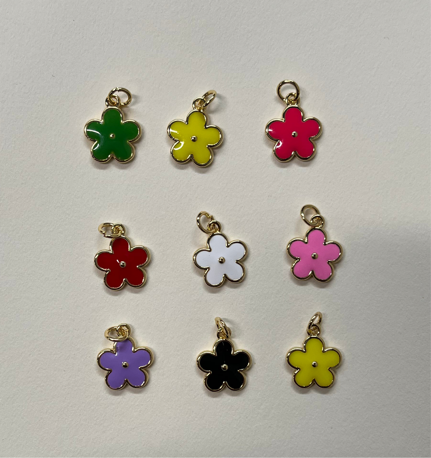 FLOWERS ENAMEL CHARMS GP 18 k