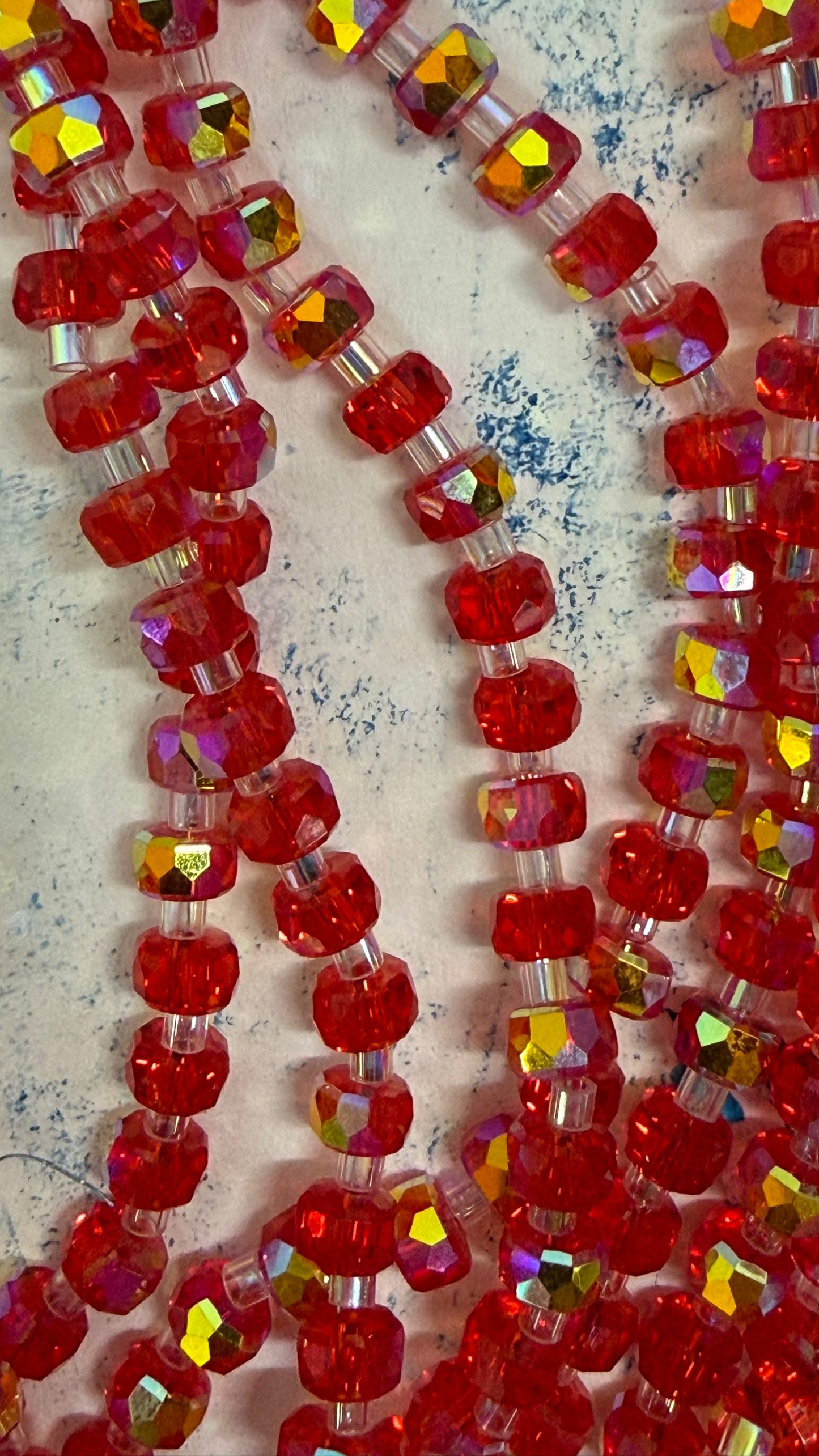 GLASS ABACUS 5.5 MM RED AB WITH SEED BEAD CONNECTORS 1 STRAND