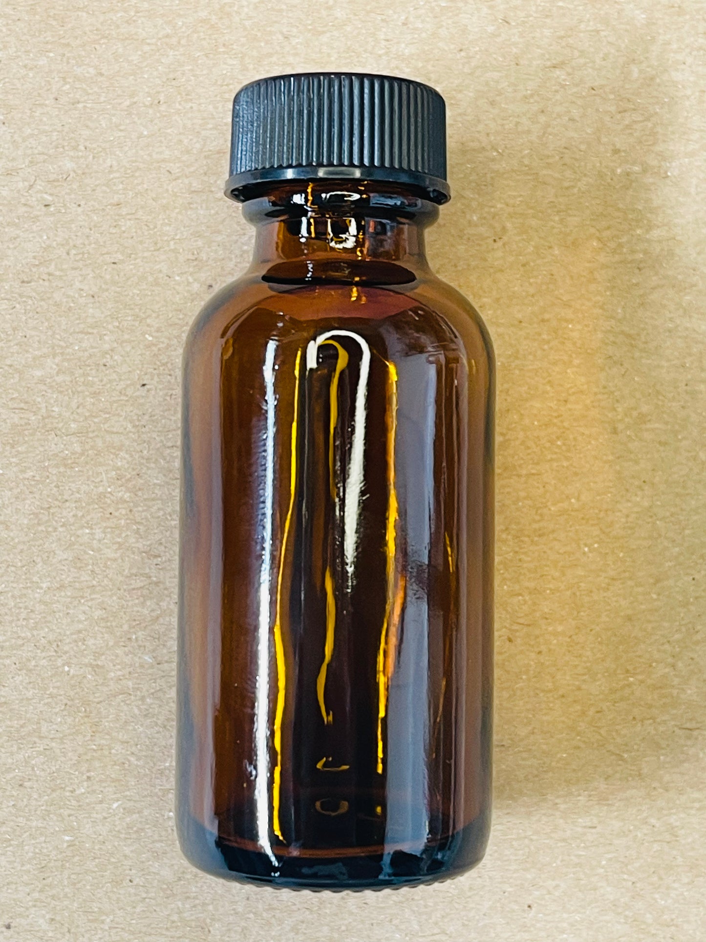 BOTELLA CRISTAL AMBAR 1 OZ CON TAPA NEGRA 20-400 1 Y 10 PZAS