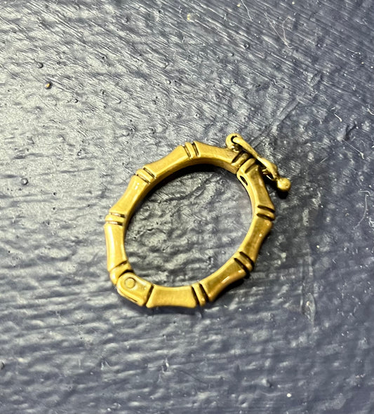 CLASP TWIST OVAL AG 26MM 1 PC