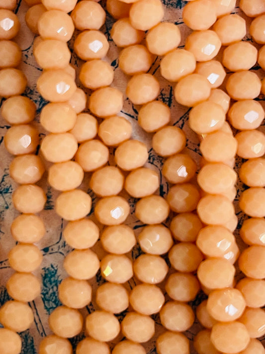 GLASS RONDELLE 6X4MM LIGHT SALMON 1 STRAND