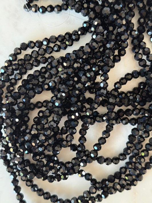GLASS ROUND 6MM BLACK 1 STRAND