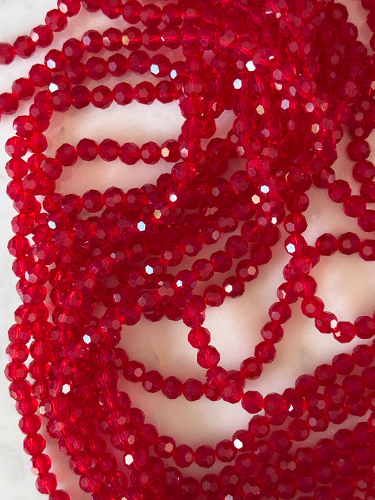 GLASS 6MM ROUND DARK RED 1 STRAND