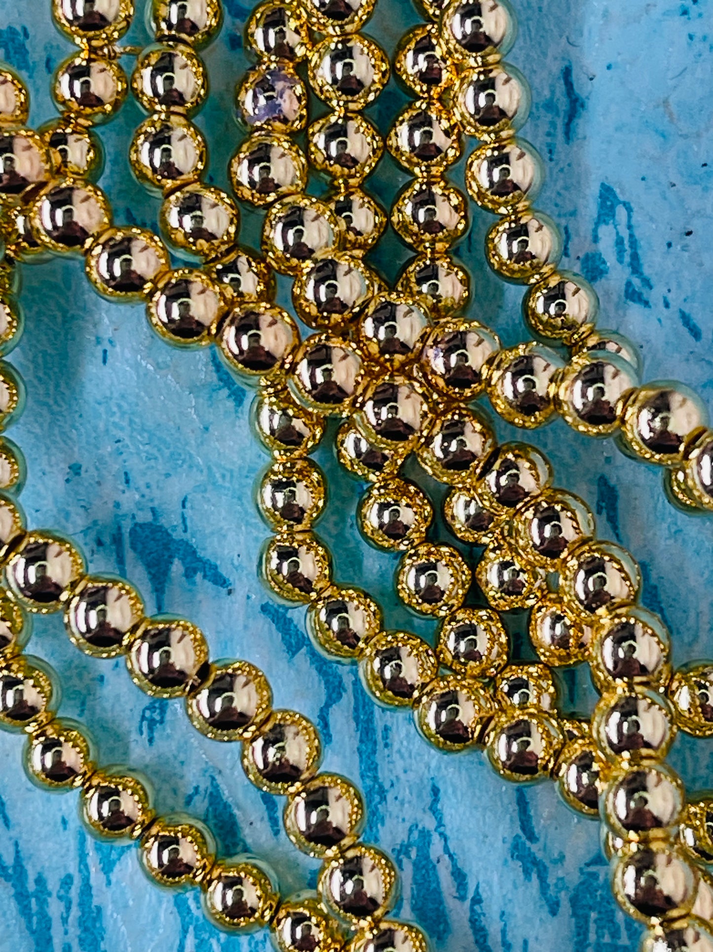 HEMATITE 4MM ROUND LIGHT GOLD PLATE ABOUT 104 BEADS PER 1 STRAND