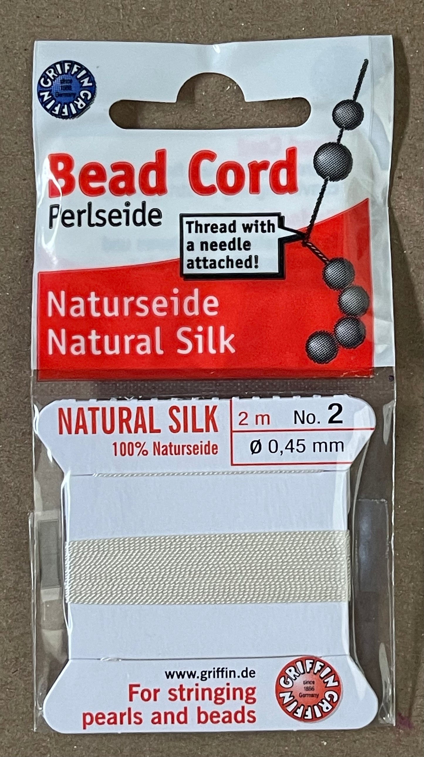 Silk cord white with needle .045 2 meters