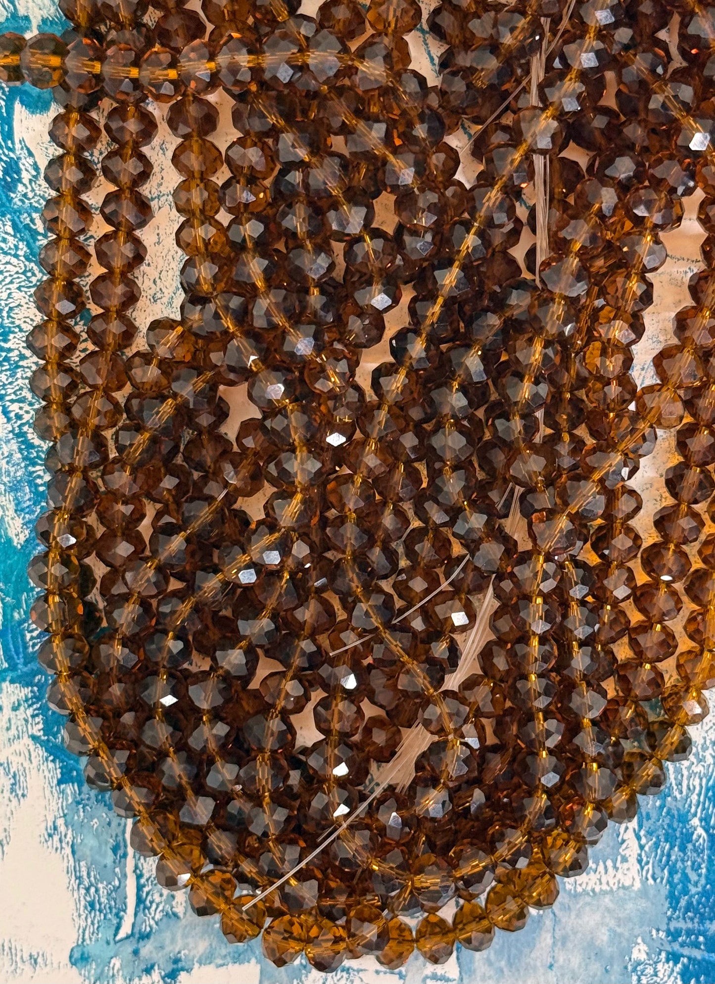 GLASS RONDELLE 8 MM DEEP AMBER CLEAR 1 STRAND