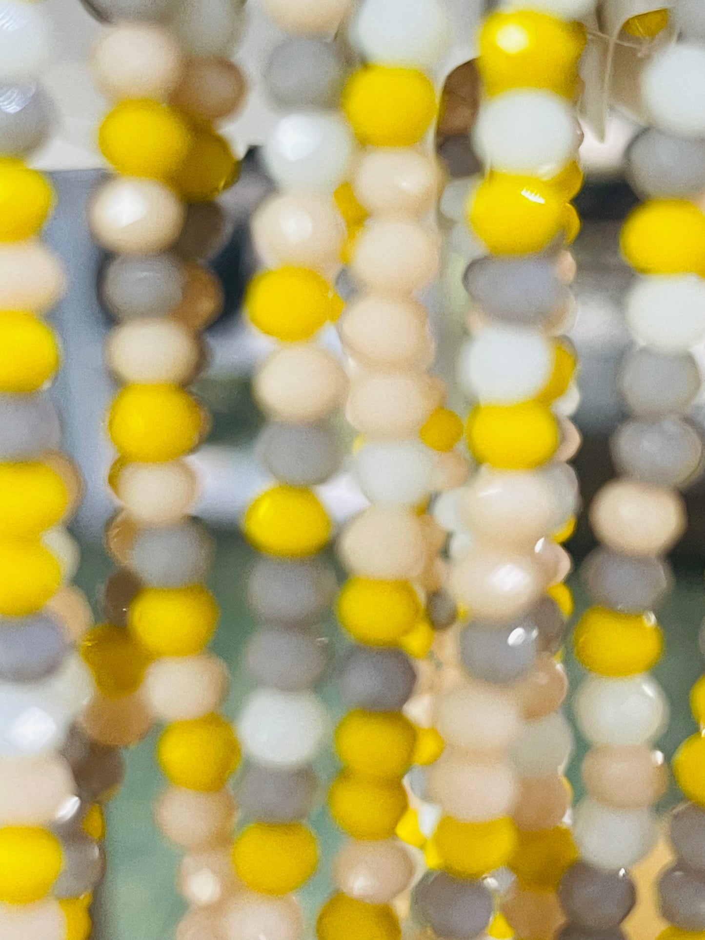 GLASS 4X3MM RONDELLE YELLOW MIX OPAQUE ABOUT 123 BEADS PER 1 STRAND