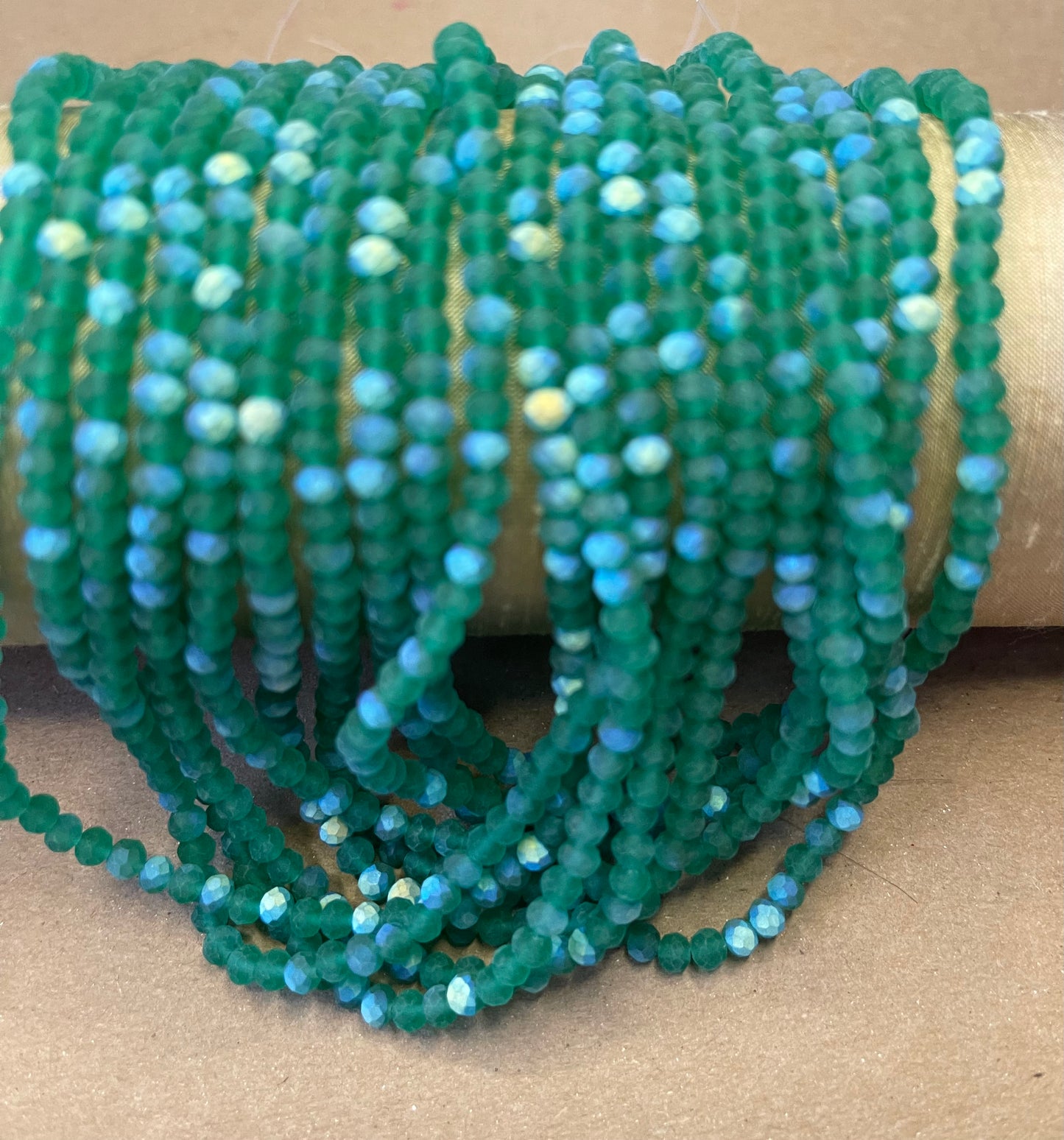 GLASS RONDELLE 4MM HALF AB FACETED AND FROSTED 1 STRAND 117 PCS