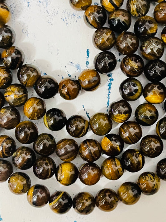 TIGER EYE 8MM ROUND 1 STRAND ABOUT 47 PC