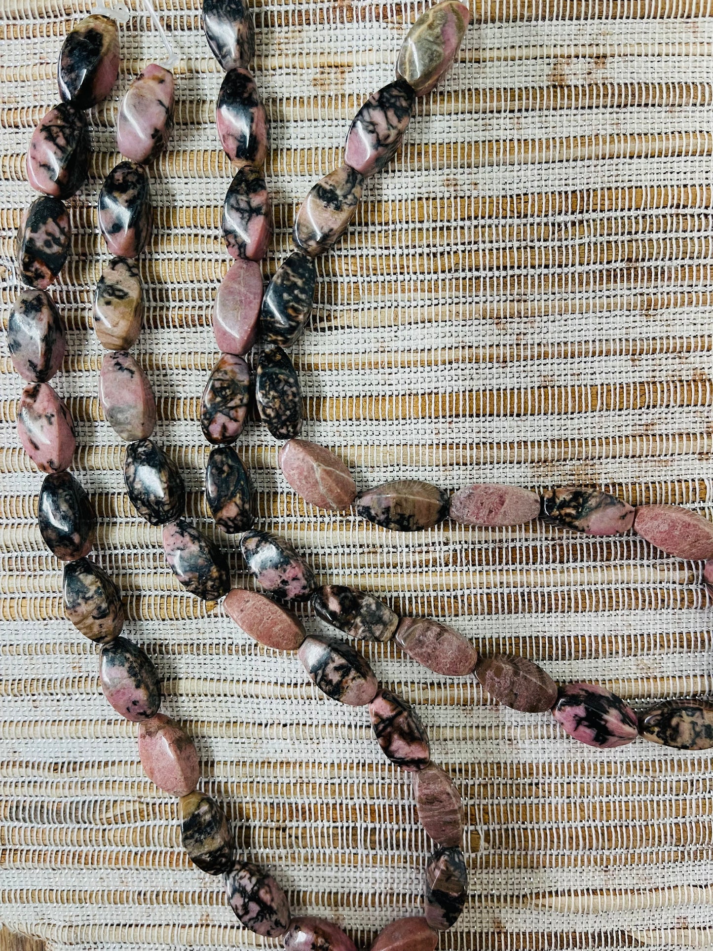 RHODONITE TWIST 17X8MM ABOUT 24 PC PER 1 STRAND