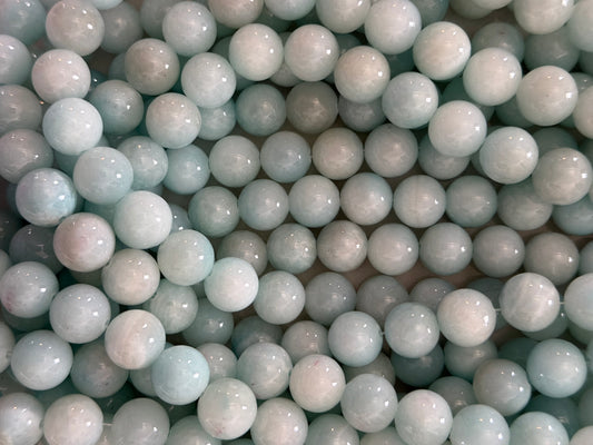 YELLOW JADE 12 MM ROUND SKY BLUE ABOUT 33 BEADS PER STRAND