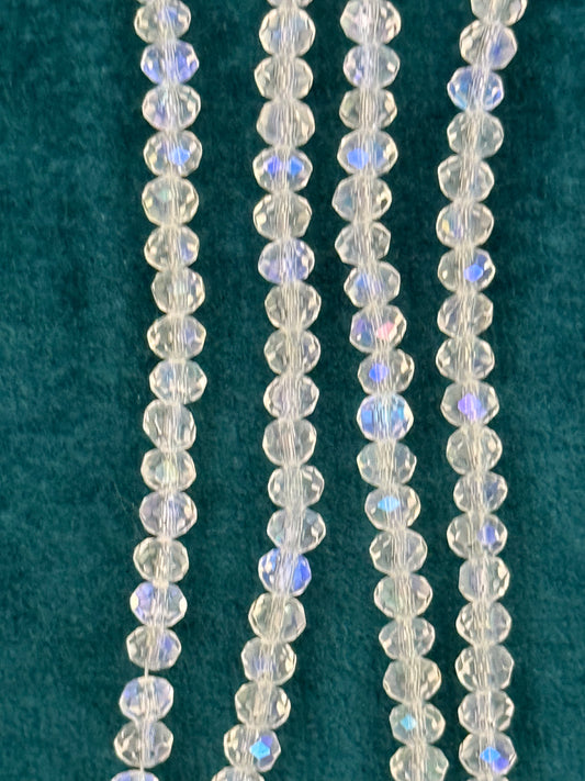 GLASS RONDELLE 4X3MM CLEAR AB 1 STRAND