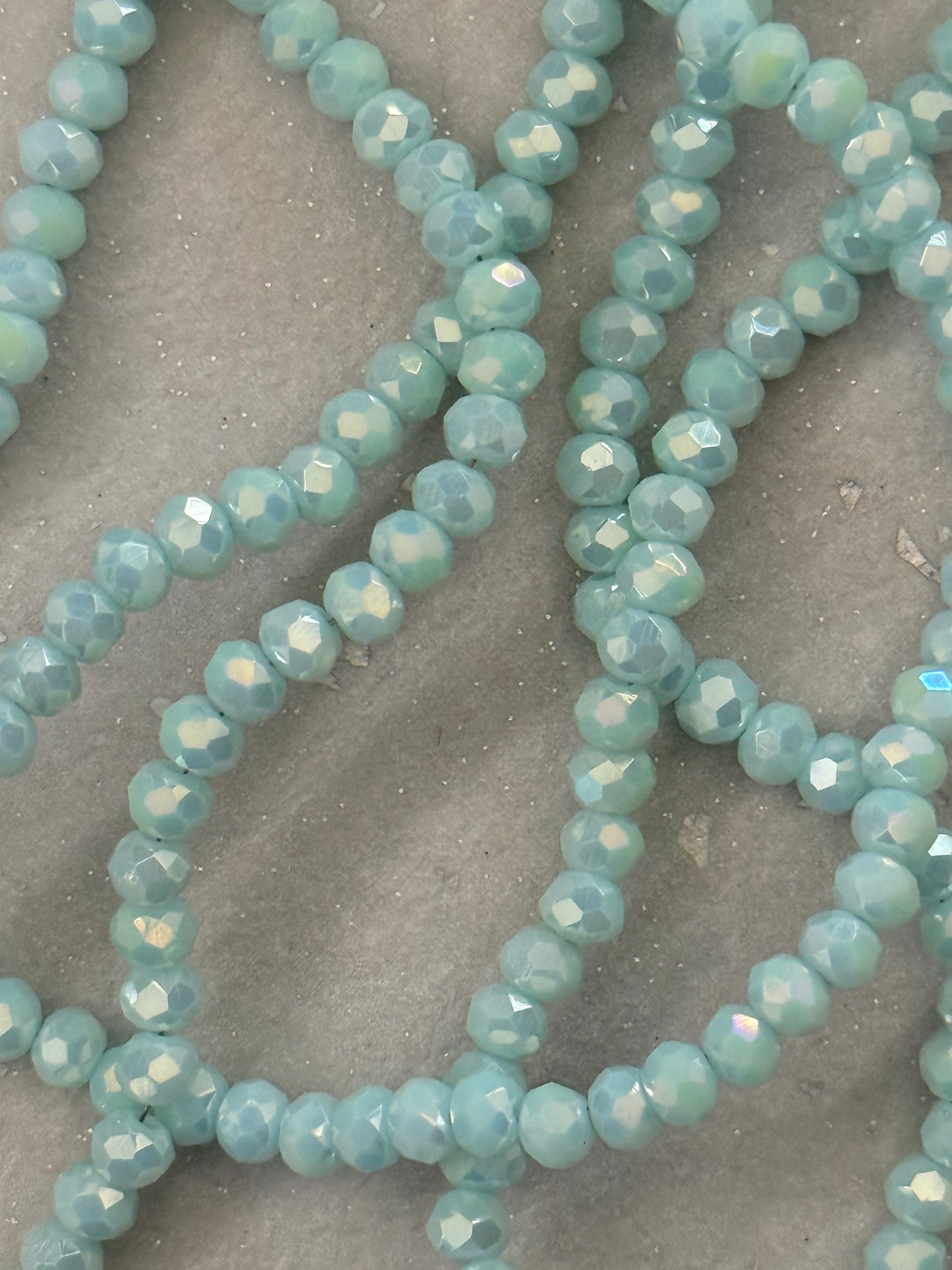 GLASS RONDELLE 4X3MM MINT GREEN 1 STRAND