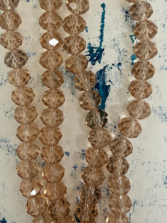 GLASS RONDELLE 8MM CHAMPAGNE CLEAR 1 STRAND