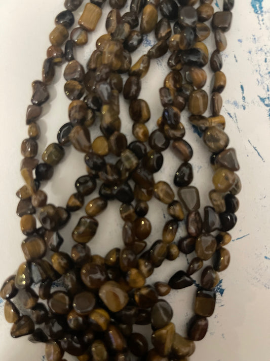 TIGER EYE NUGGETS 7-14MM 1 STRAND ABOUT 44-50 PCS