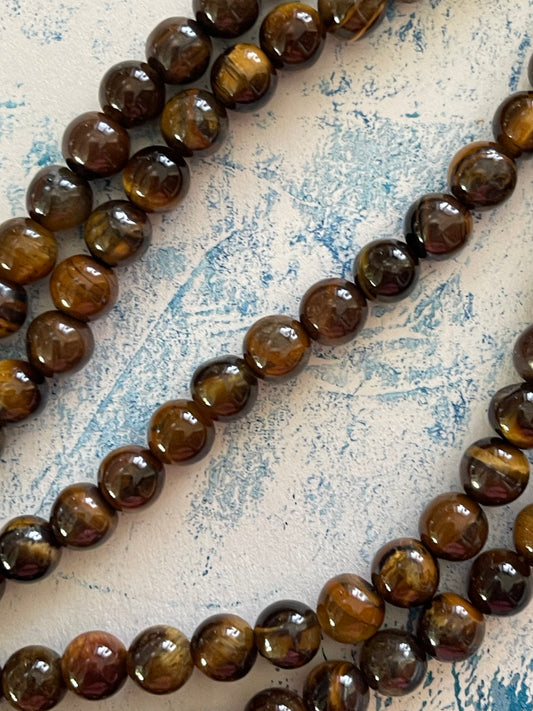 TIGER EYE 6MM ROUND 15.5 INCHES 1 STRAND