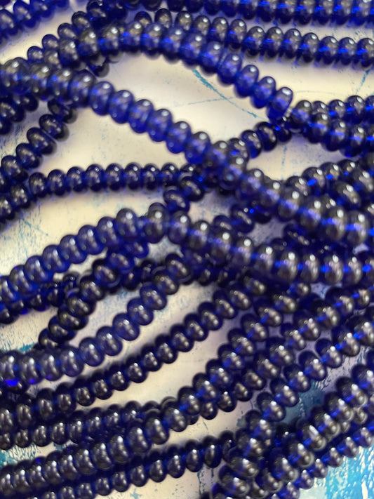 GLASS RONDELLE 8MM MIDNIGHT BLUE 1 STRAND