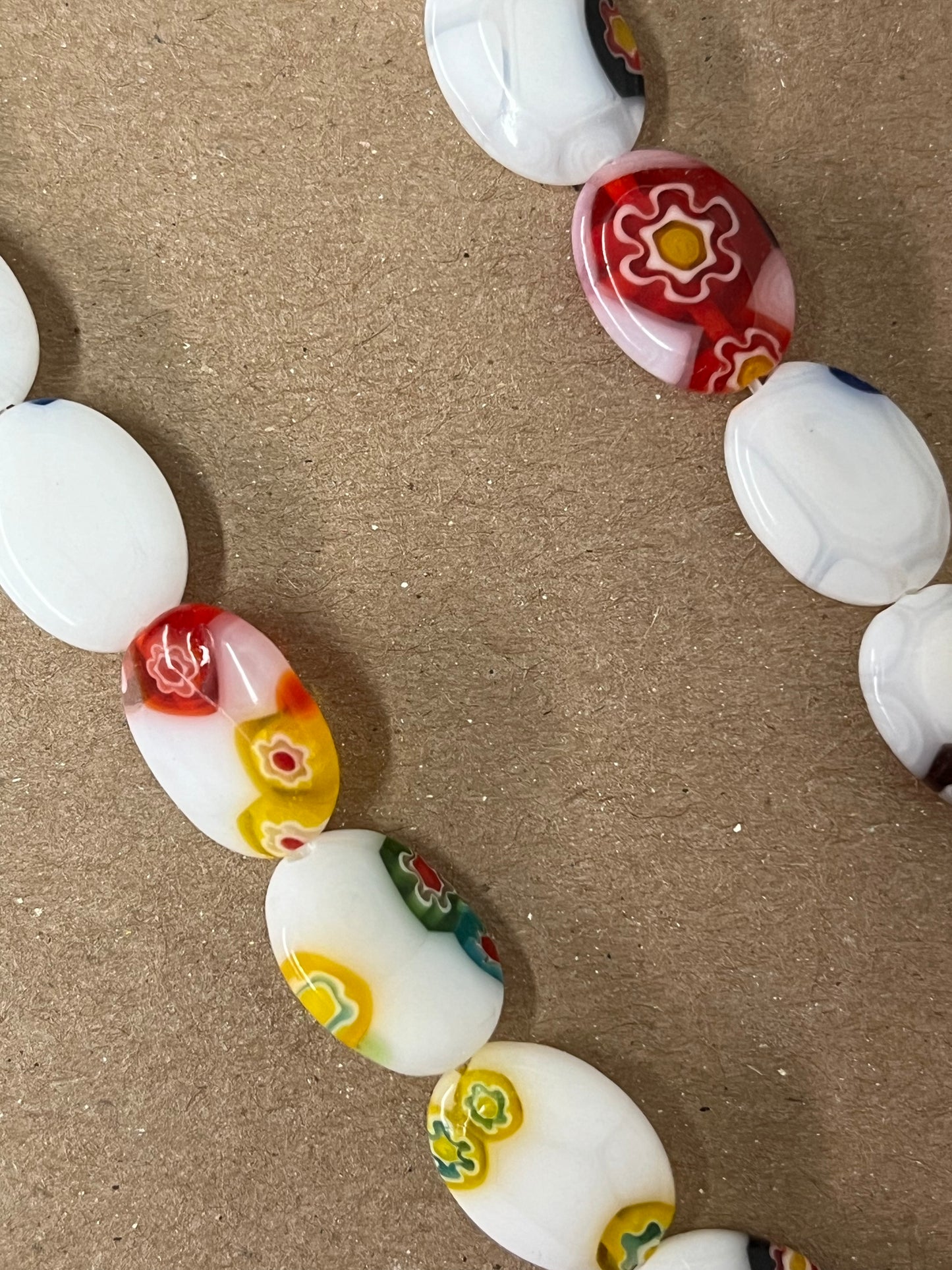 GLASS MILLEFORE OVAL WHITE MULTI 14X10MM 1 STRAND