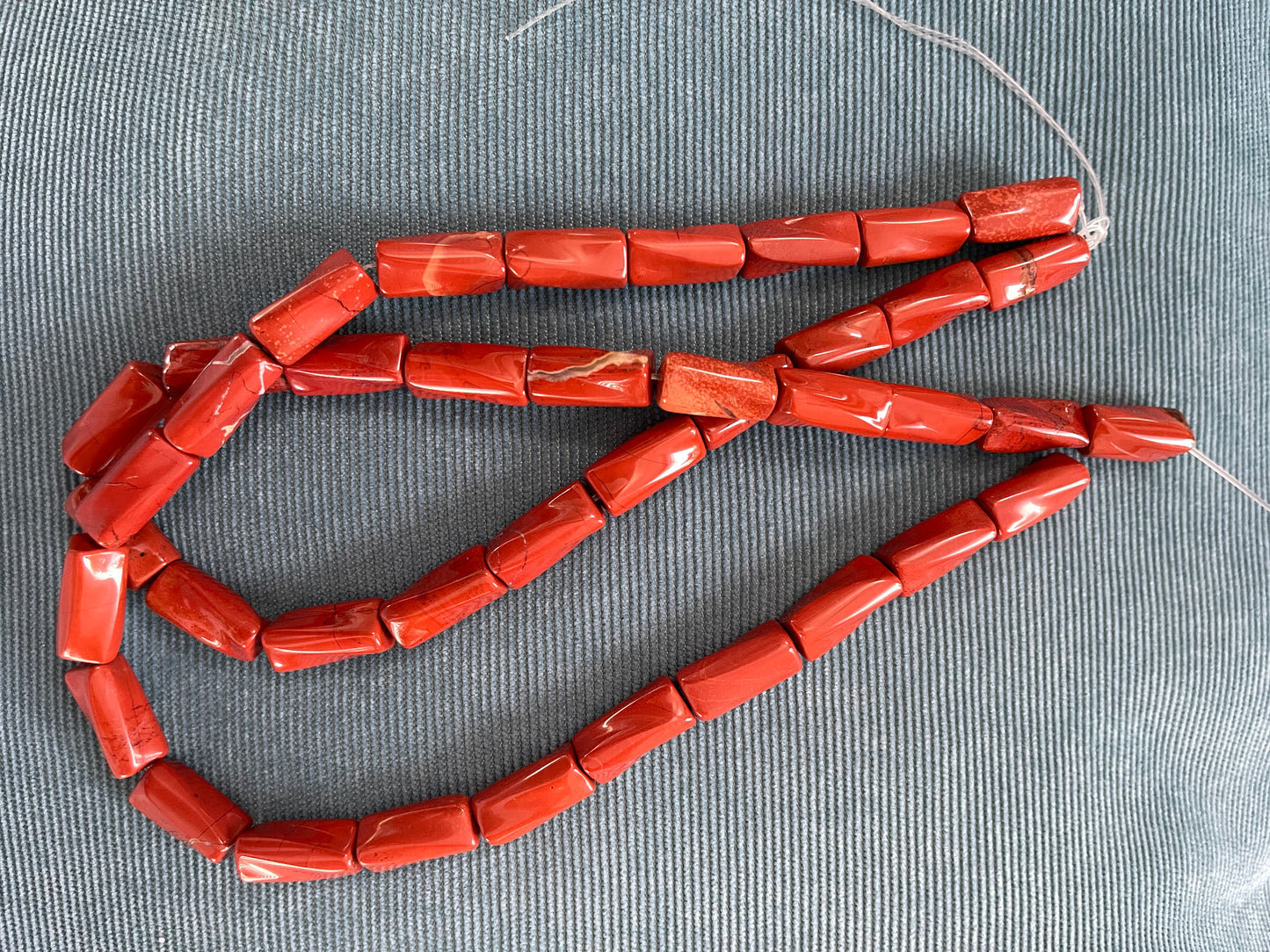 RED JASPER 21X10MM RECTANGLE 1 STRAND ABOUT 20 PCS