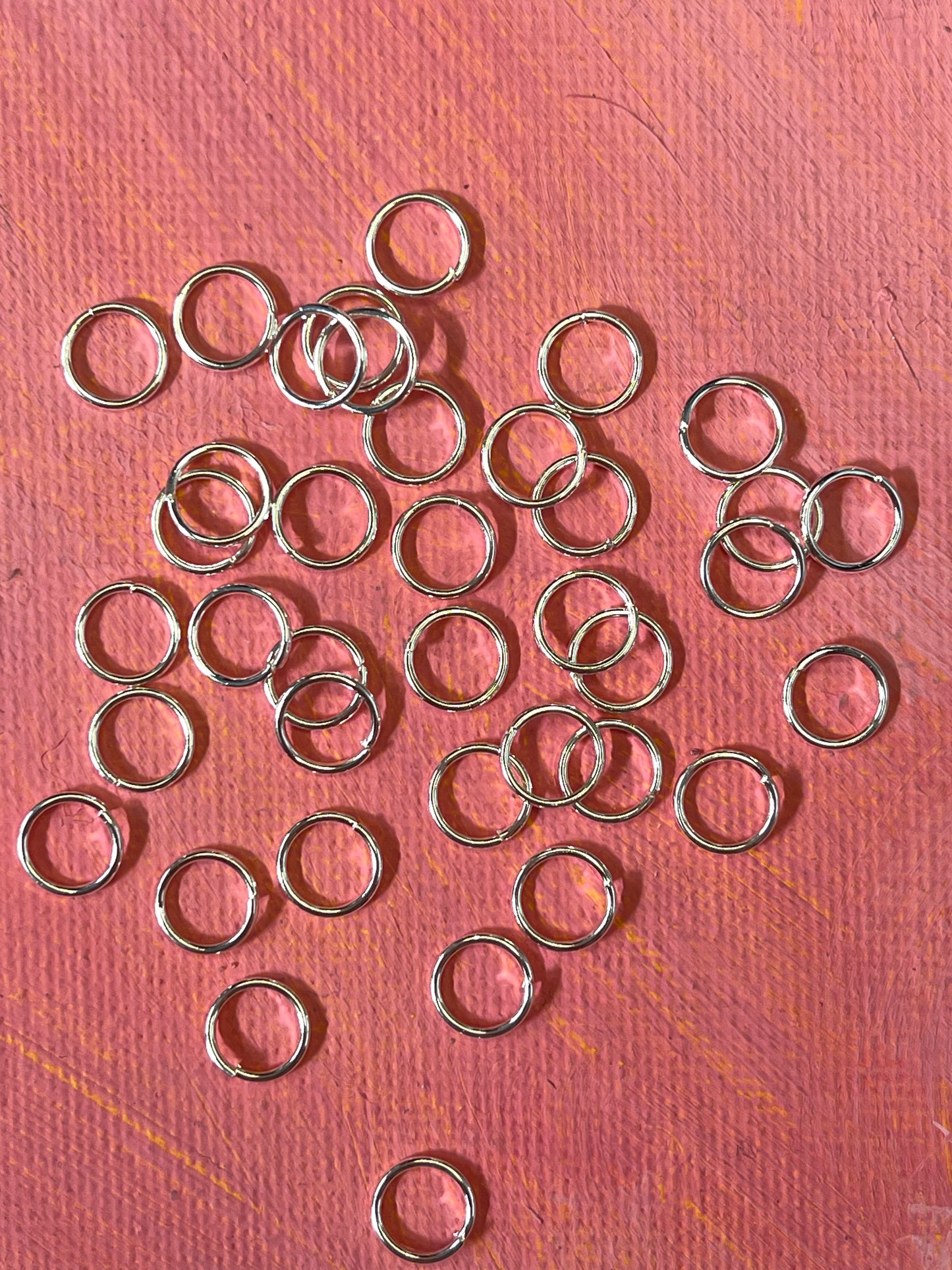 JUMPRING 7MM SILVER PLATE 20GA 50 PC