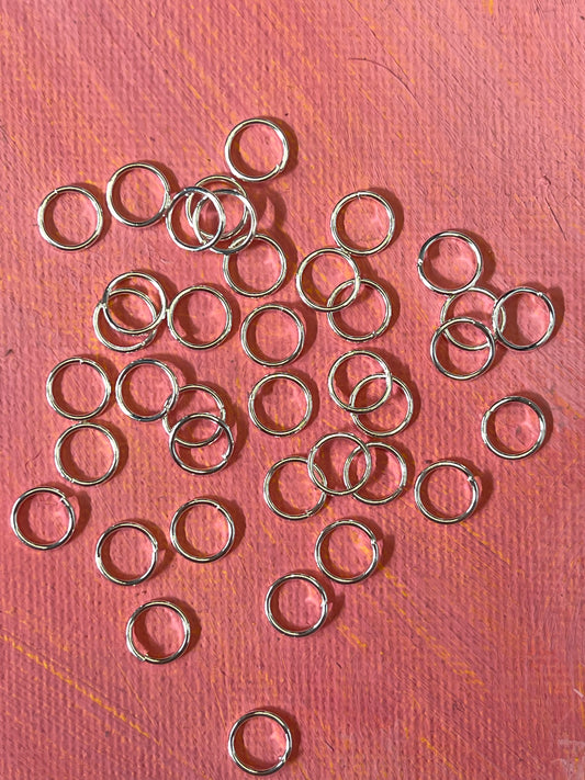 JUMPRING 7MM SILVER PLATE 20GA 50 PC