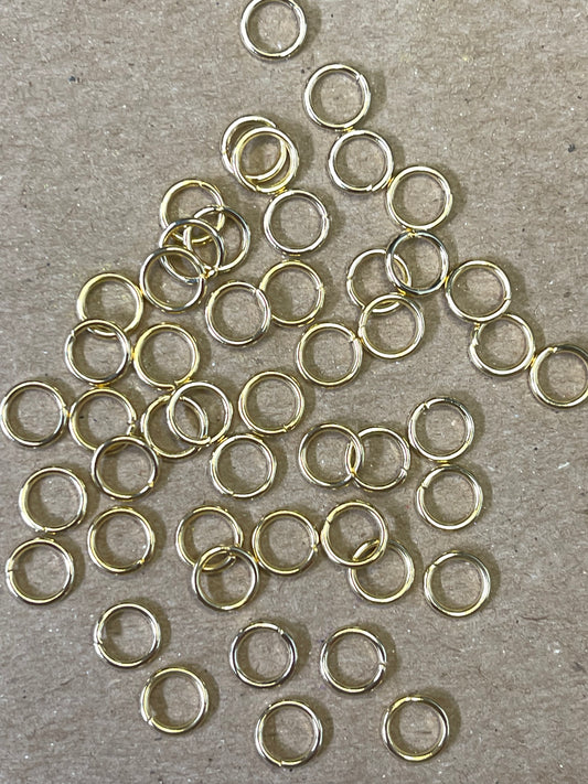 JUMPRING 7MM SST GOLD PLATE 24KT 18 GA 50 PC