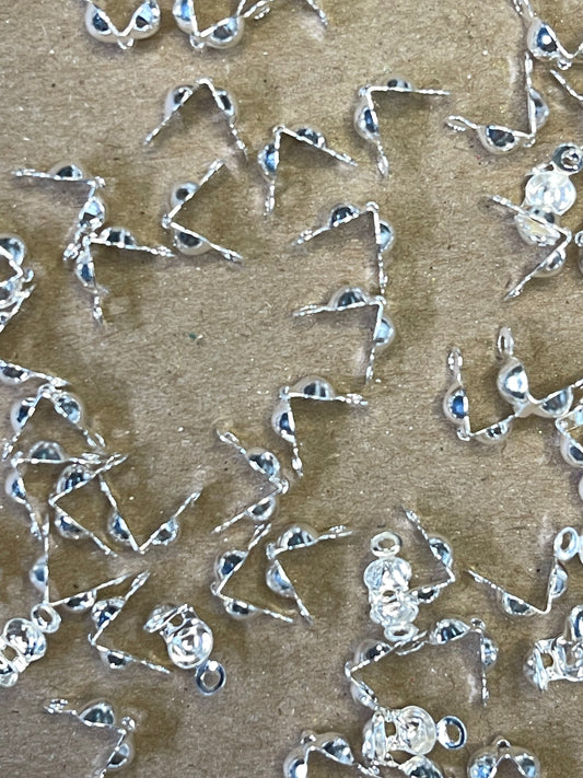 KNOT COVER CLAMSHELL 7.5X4MM SILVER PLATE 50 PC