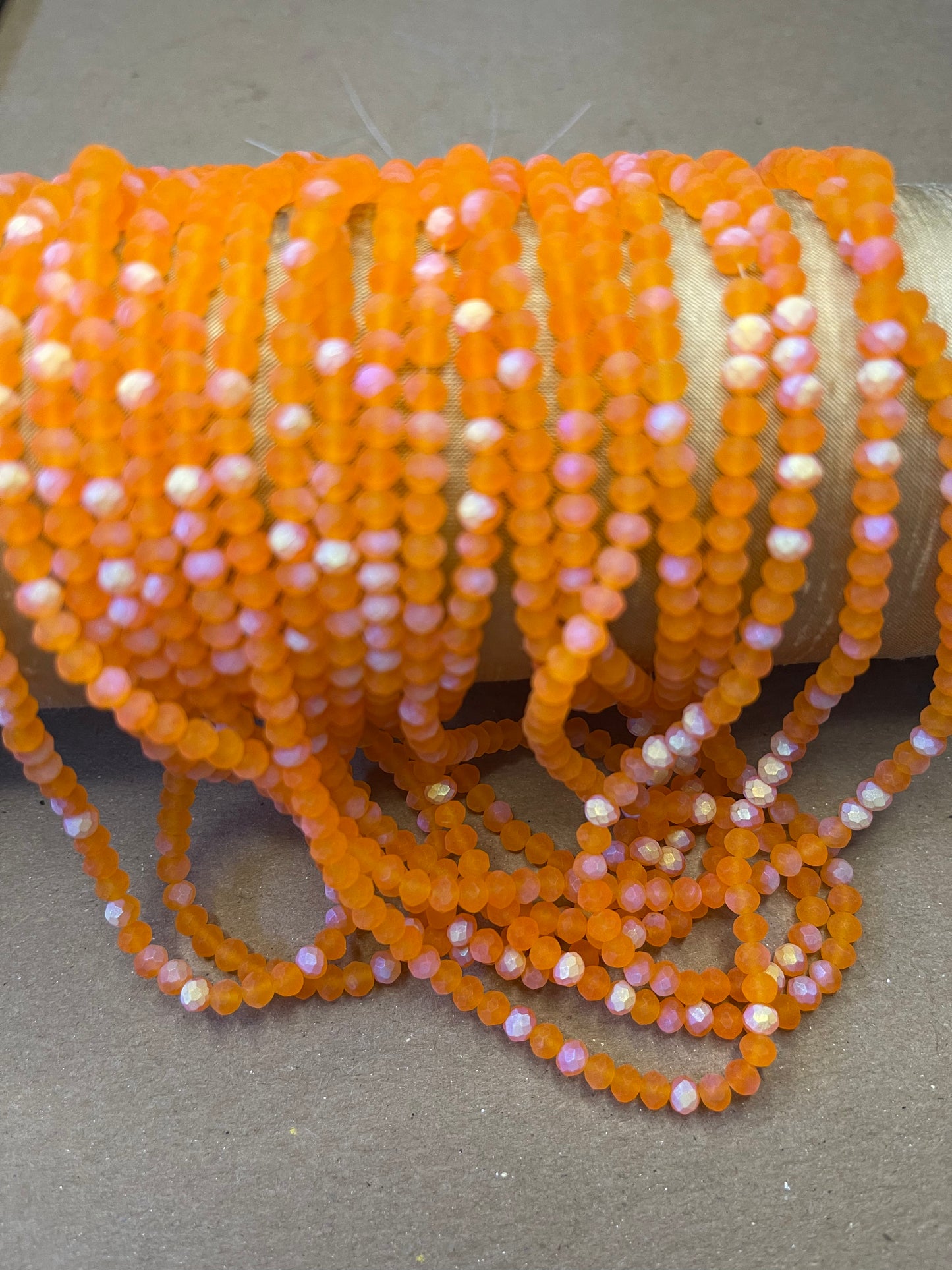 GLASS RONDELLE 4MM HALF AB FACETED AND FROSTED 1 STRAND 117 PCS