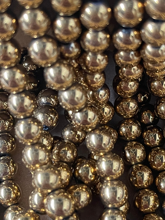 HEMATITE 8MM ROUND GOLD PLATE 50 PC PER 1 STRAND