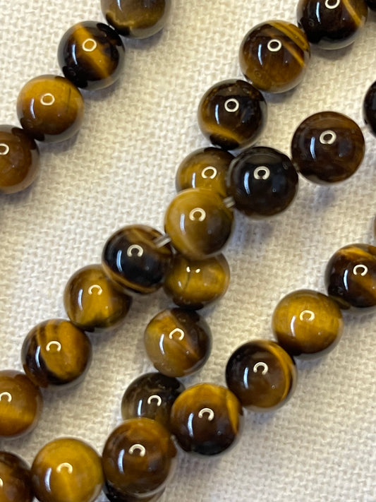 TIGER EYE ROUND 6MM 24 PCS 1 STRAND