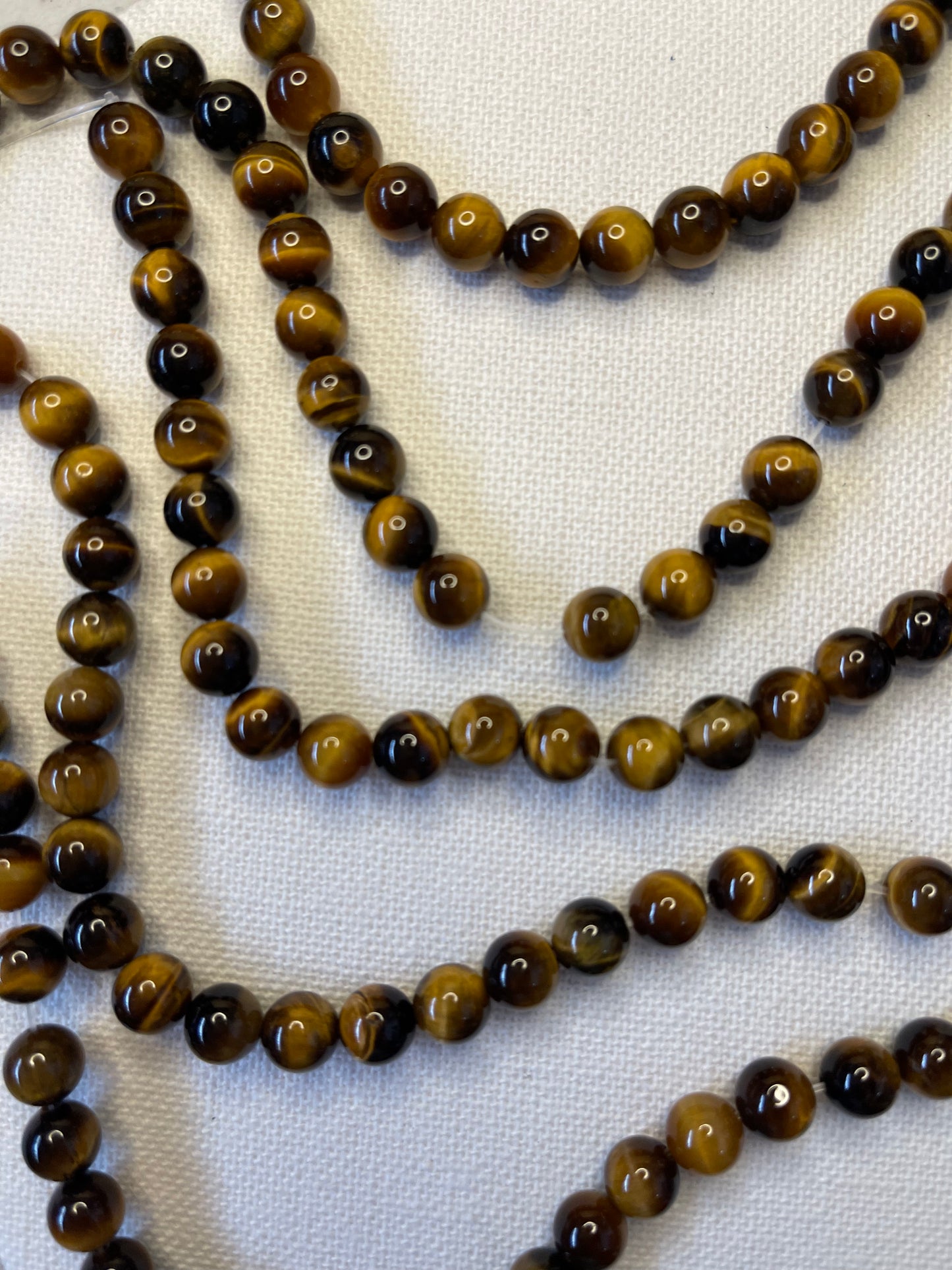 TIGER EYE ROUND 6MM 24 PCS 1 STRAND