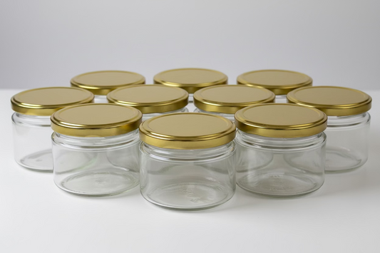 JAR 6 OZ GLASS GOLD CAP RND 82 MM