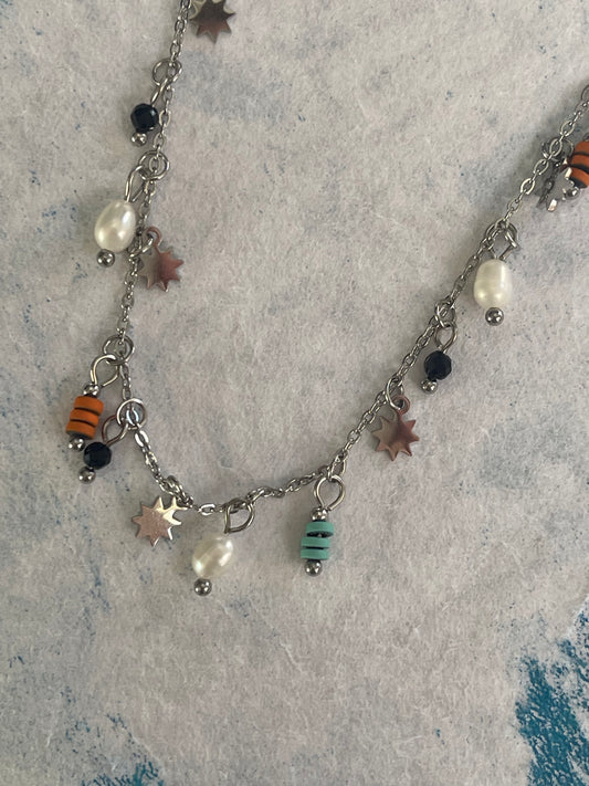 Necklace chain stainless steel 18” with very small silver charms