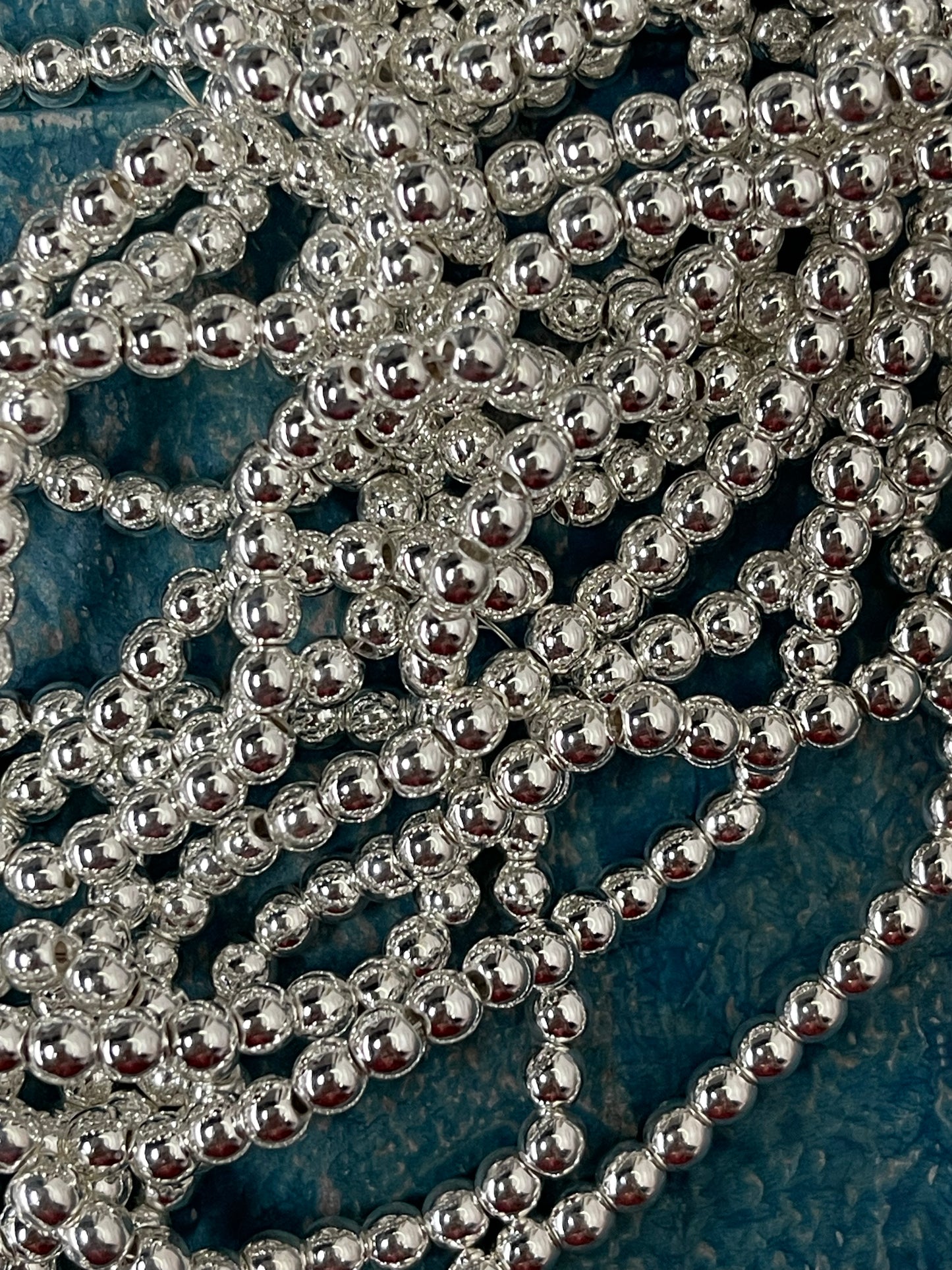 HEMATITE 4MM ROUND SILVER PLATE ABOUT 95 PC PER 1 STRAND