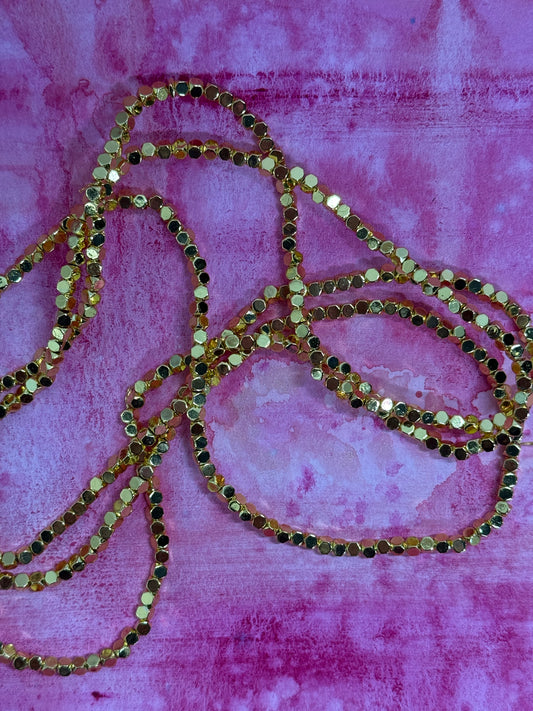 HEMATITE CUBE 3X3X3MM GOLD PLATE 1 STRAND