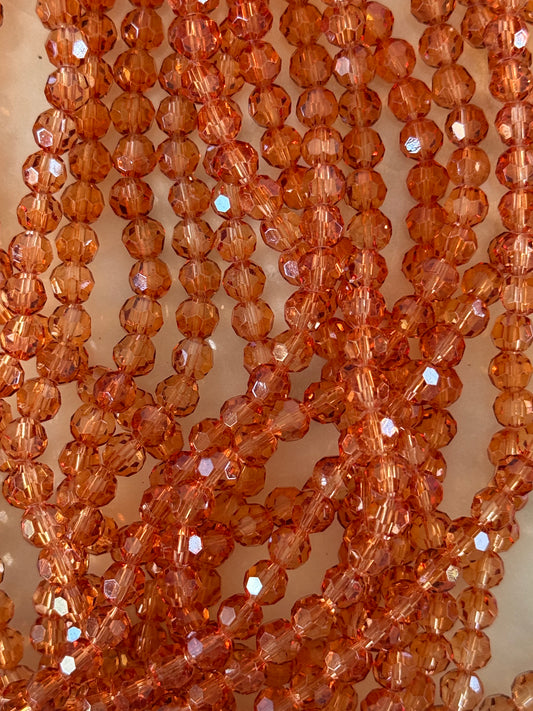 GLASS 6MM ROUND CHOCOLATE, 1 STRAND