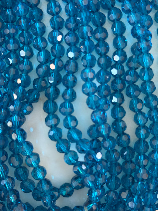 GLASS 6MM ROUND dark turquoise 1 STRAND