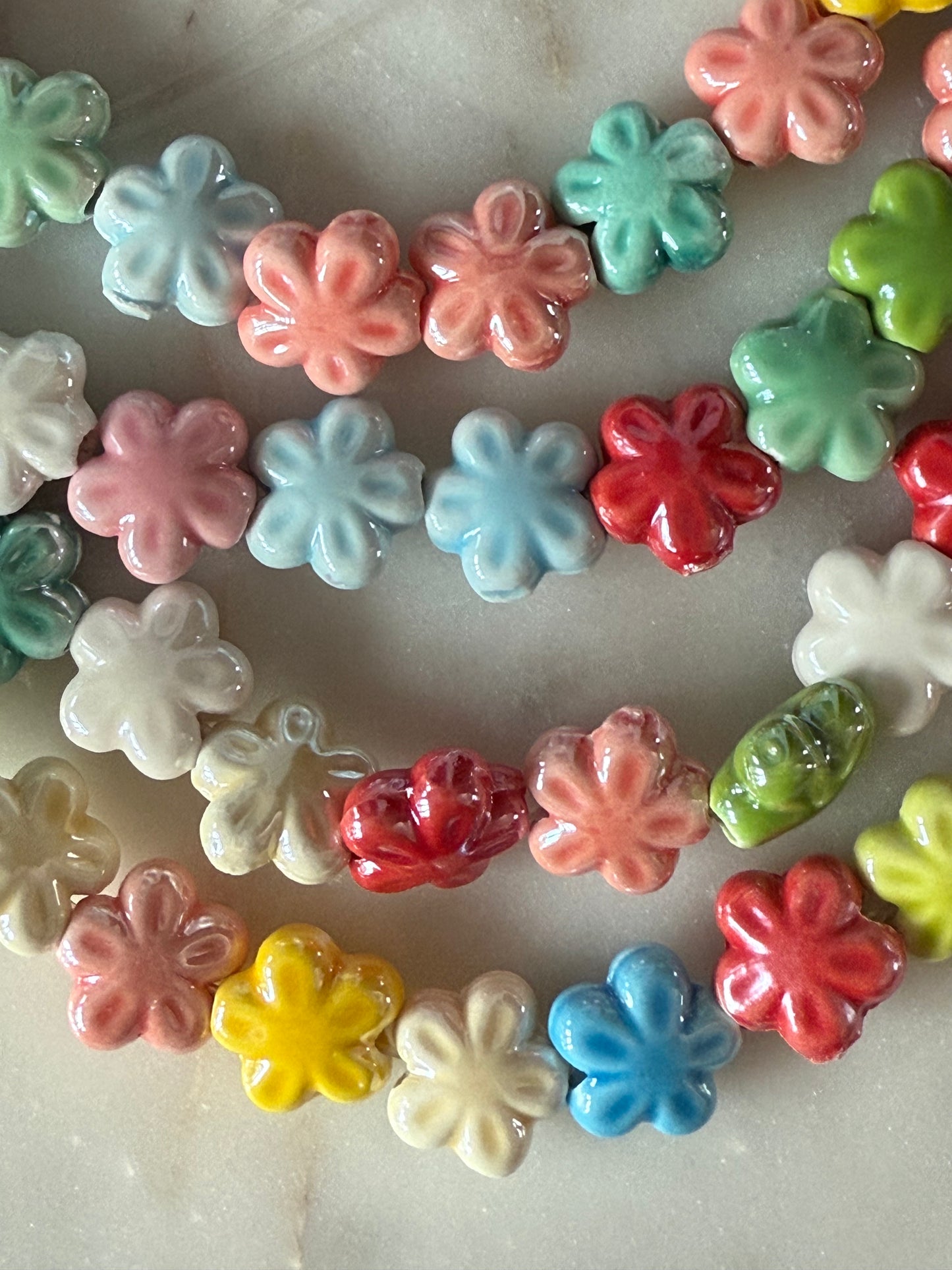 PORCELAIN FLOWER BEAD 11X11 IXED COLORS 30 PCS PER 1 STRAND